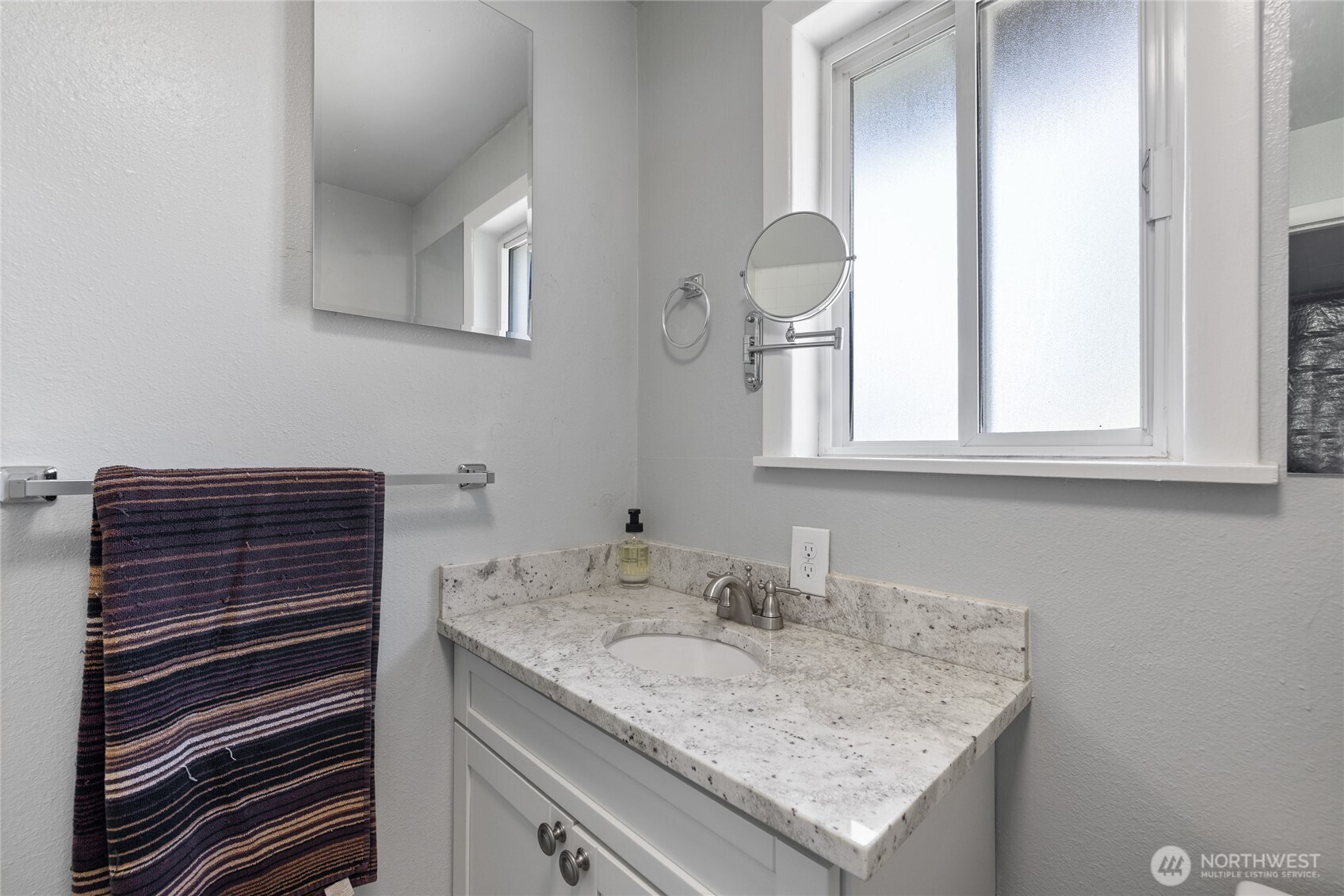 Large laundry room offers a panty area and room to add more storage
