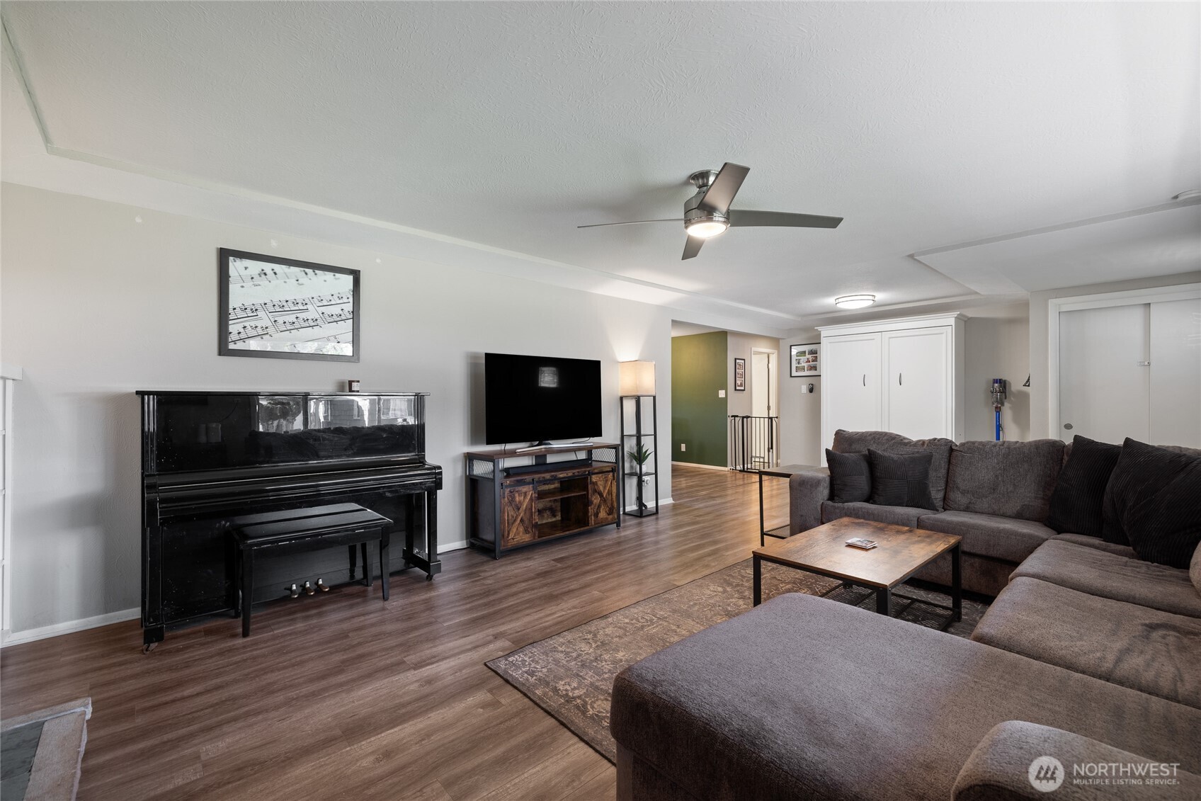 Large living area features a Murphy bed for over night guests