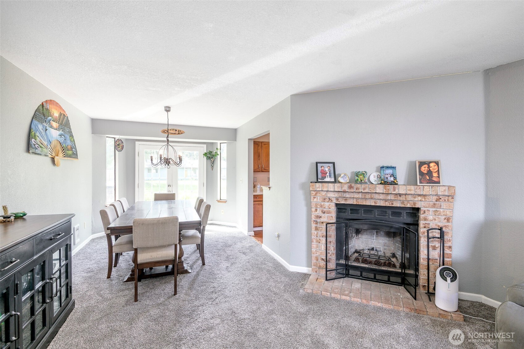 Living room with wood burning fireplace