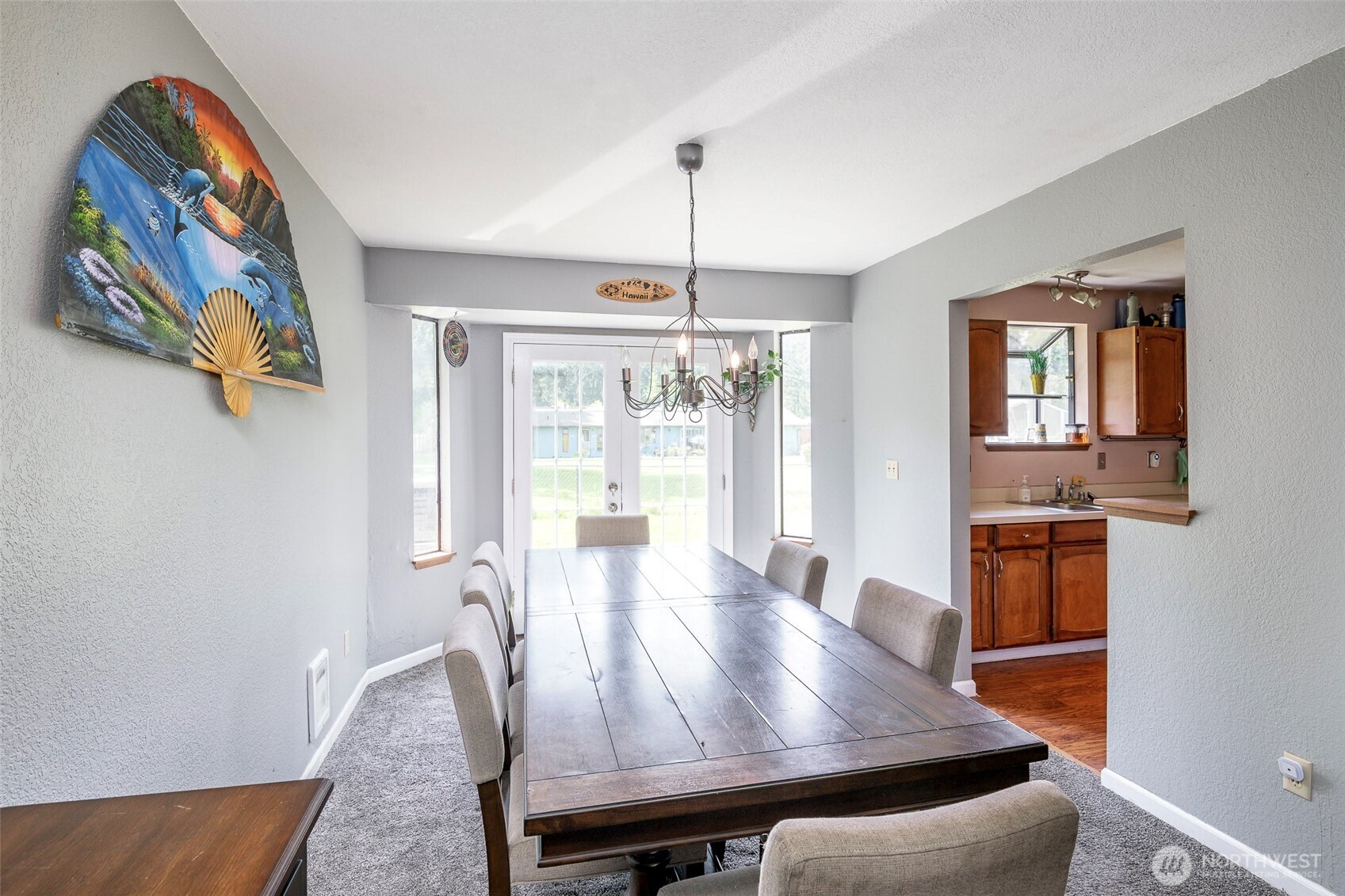 Dining room w/ french doors to backyard