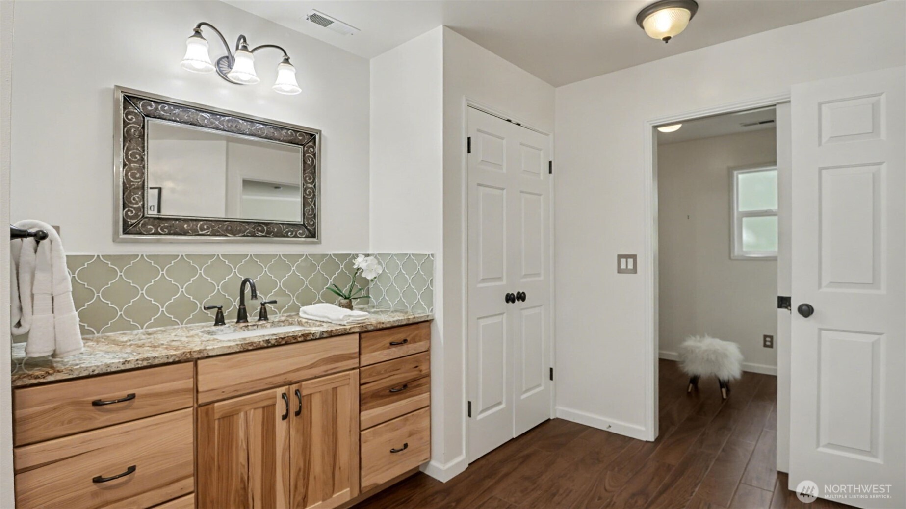 Sink area #2 with granite countertops.