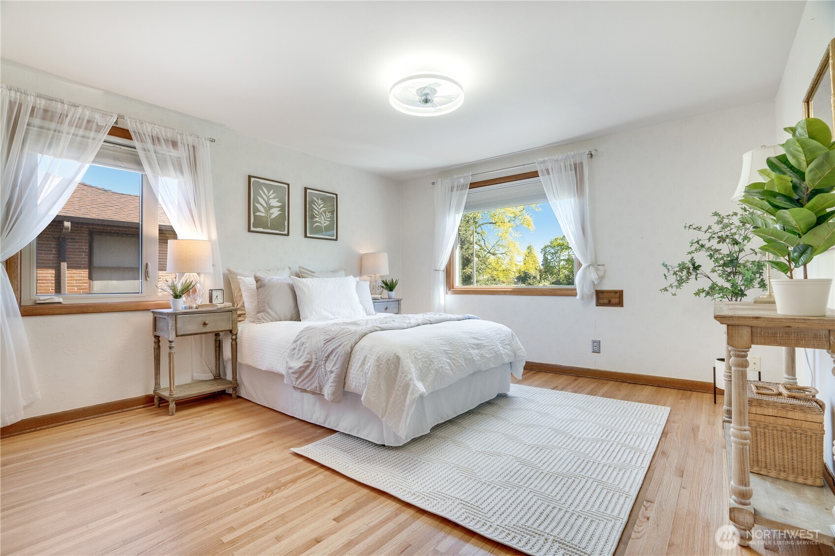 One of two main floor bedrooms. This may serve as the primary bedroom.