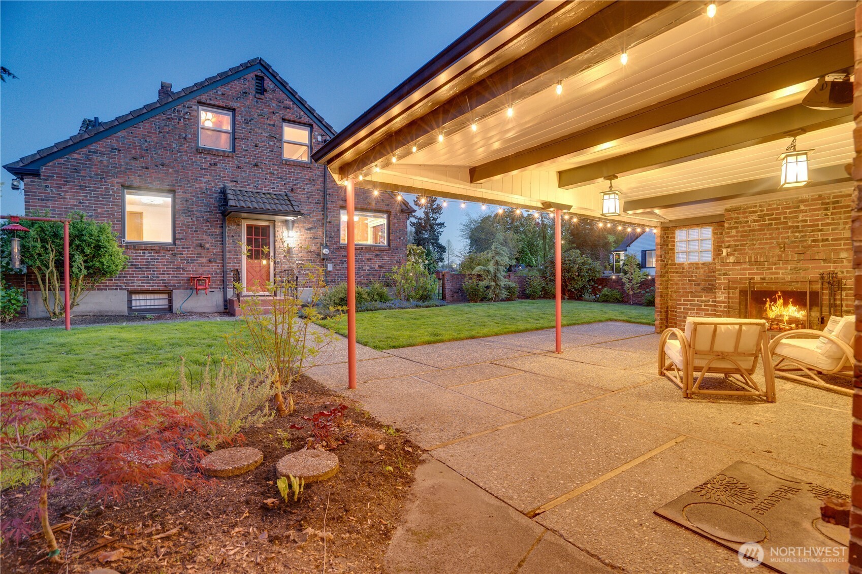2nd patio. Photo is edited to include fire. Seller has not made a fire here.