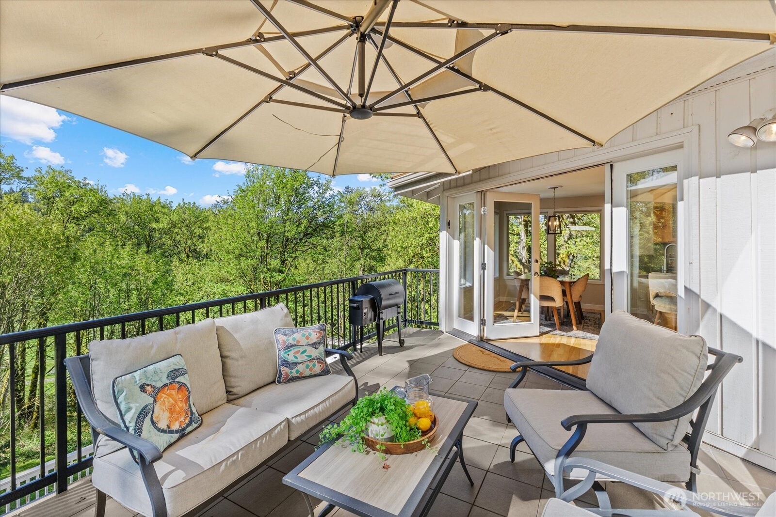 Seamless flow from kitchen to dining to outdoor living