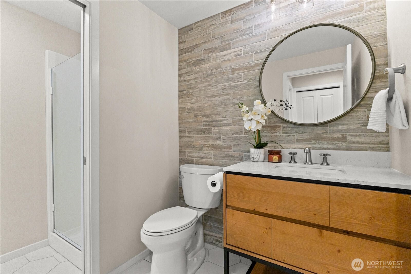 Spacious main-floor office or den with adjacent 3/4 bath