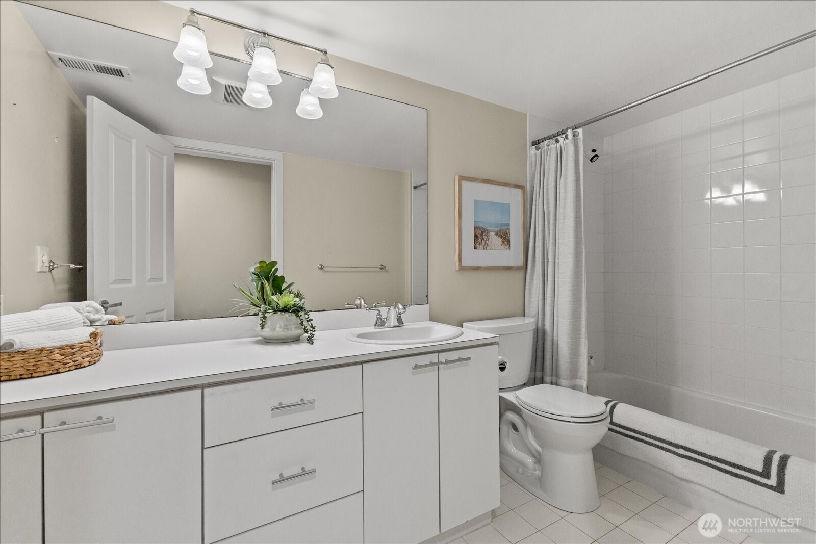 A welcoming lower-level bedroom designed for comfort and privacy. Virtually staged for inspiration