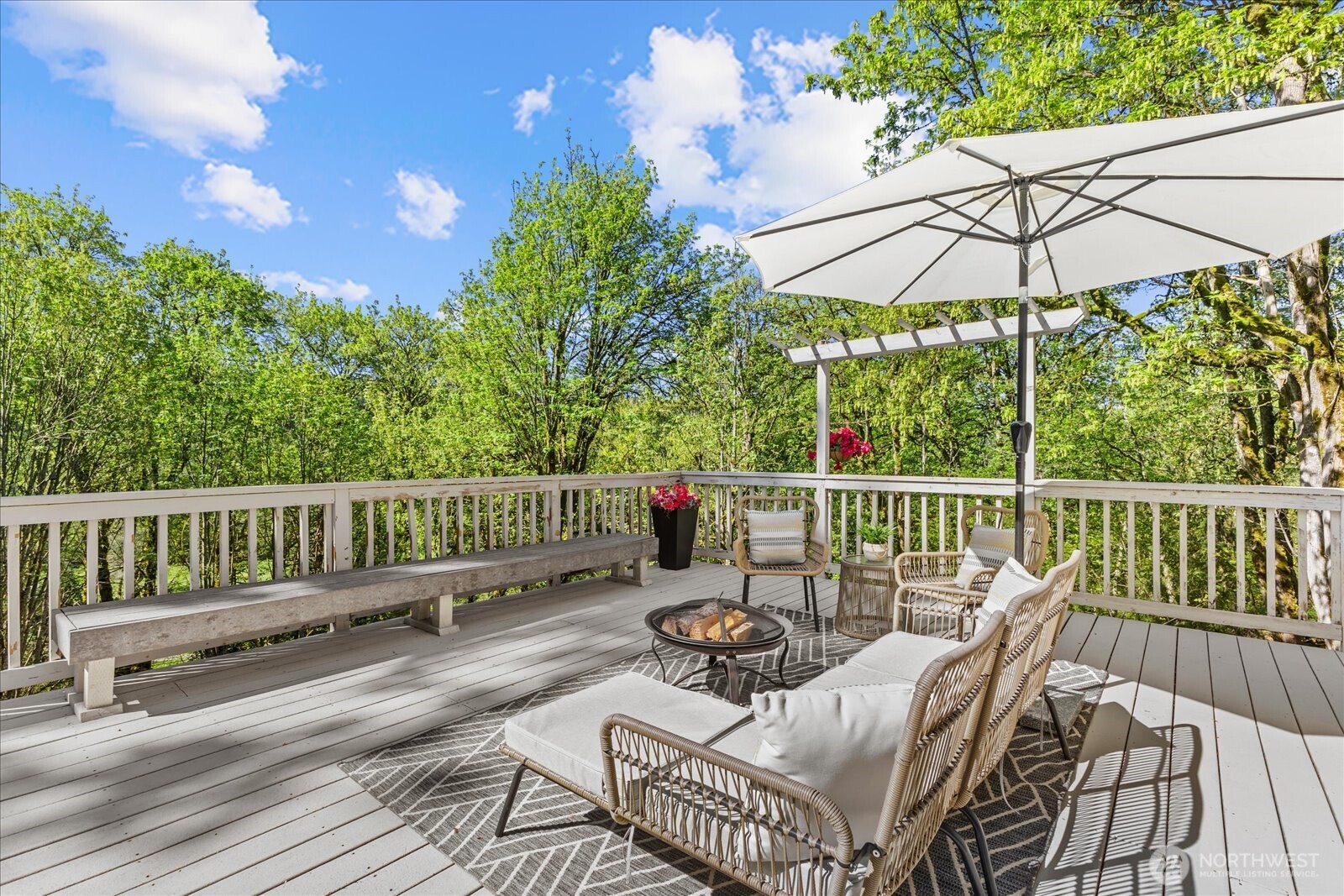 Resort-style outdoor living immersed in peaceful and private scenery