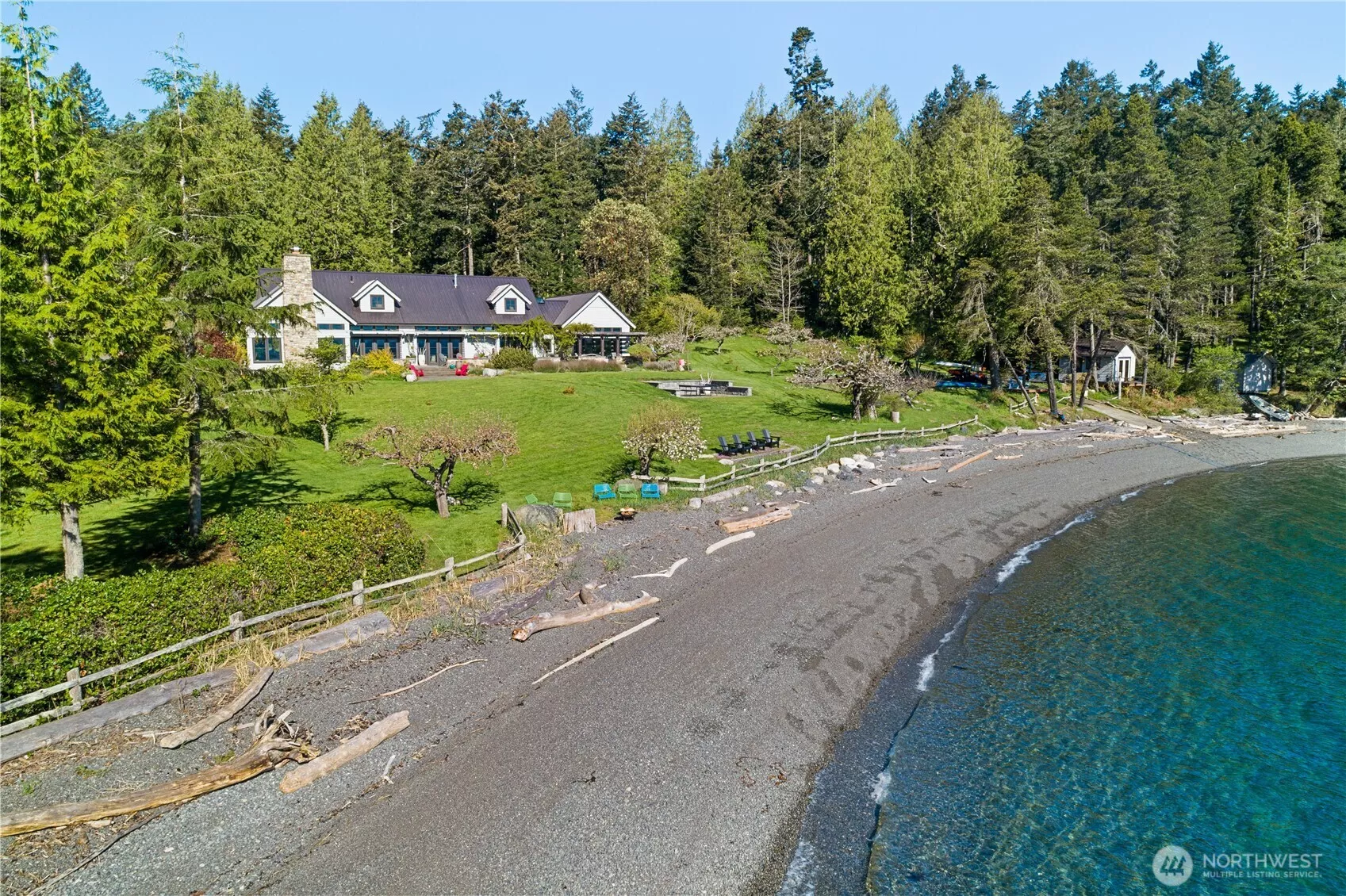 330 feet of private soft pebble beach in Rocky Bay. World class crabbing and spotted prawn in this bay. Registered mooring buoy, anchorage in bay suitable for 150 ft yacht, plus plenty of open space to land a helicopter in the expansive front yard.Beach at low tide. The tide swing is typically 2ft to 8ft.  Approximately 330 lineal feet of pebble beach offers gentle landings for boats, paddle boards, kayaks and swimmers.