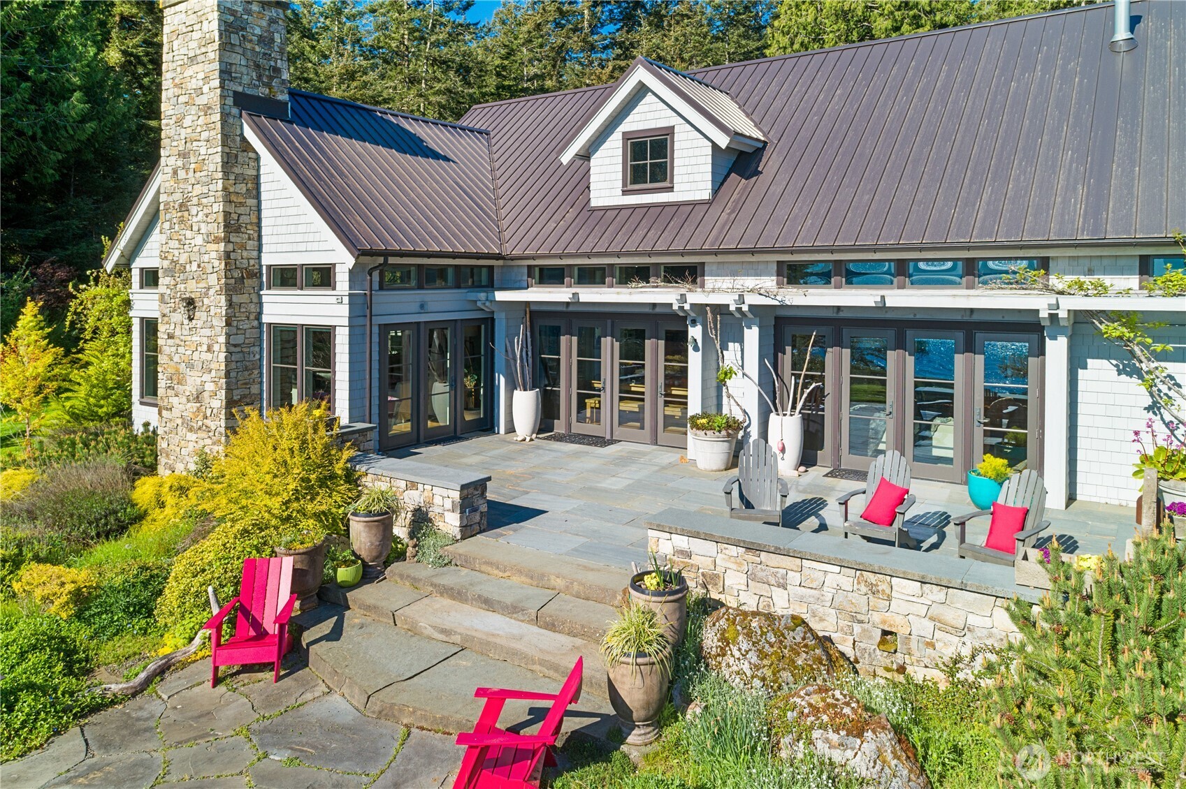 Spacious, well-designed patios embrace the best of San Juan Island living, from glowing mornings to sun-drenched afternoons - ideal for relaxed comfort and effortless entertaining.