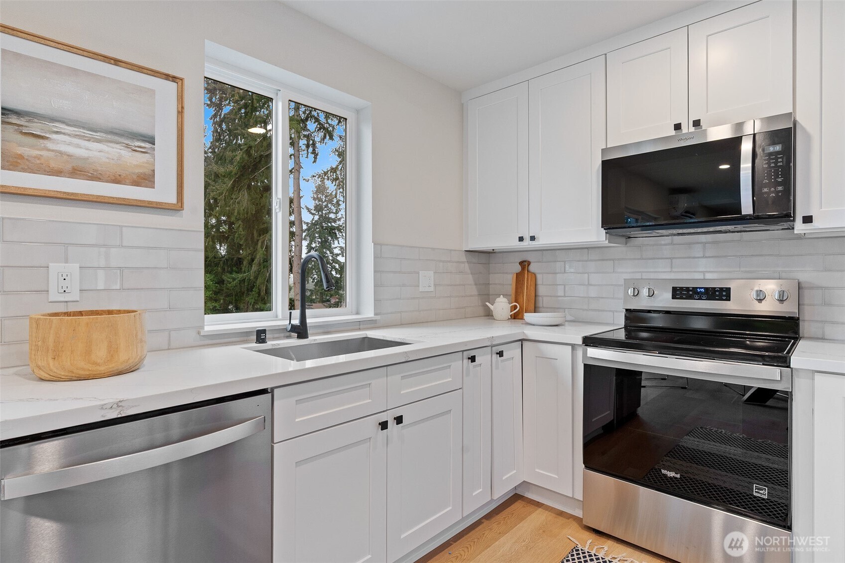 Bright kitchen with window over the sink.