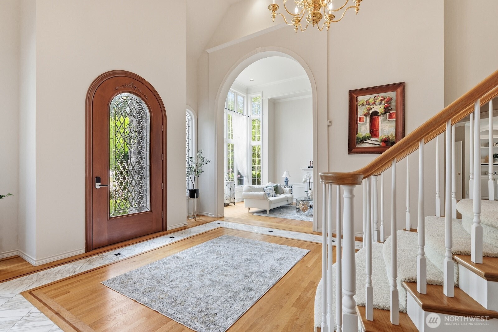 New hardwood floors throughout the main floor and upstairs.