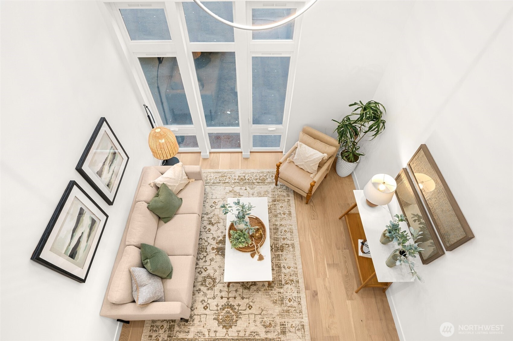 Stunning mezzanine overlook showcases the home's impressive volume and architectural scale.