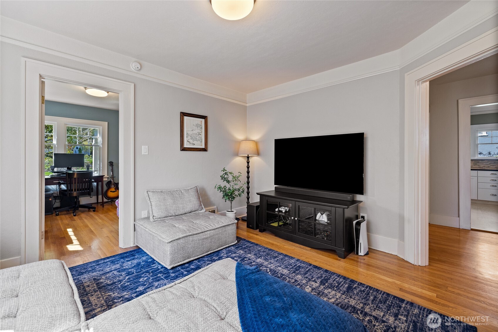 Second view of the middle bedroom on the main floor.   Opens to the front bedroom & the main floor hallway.