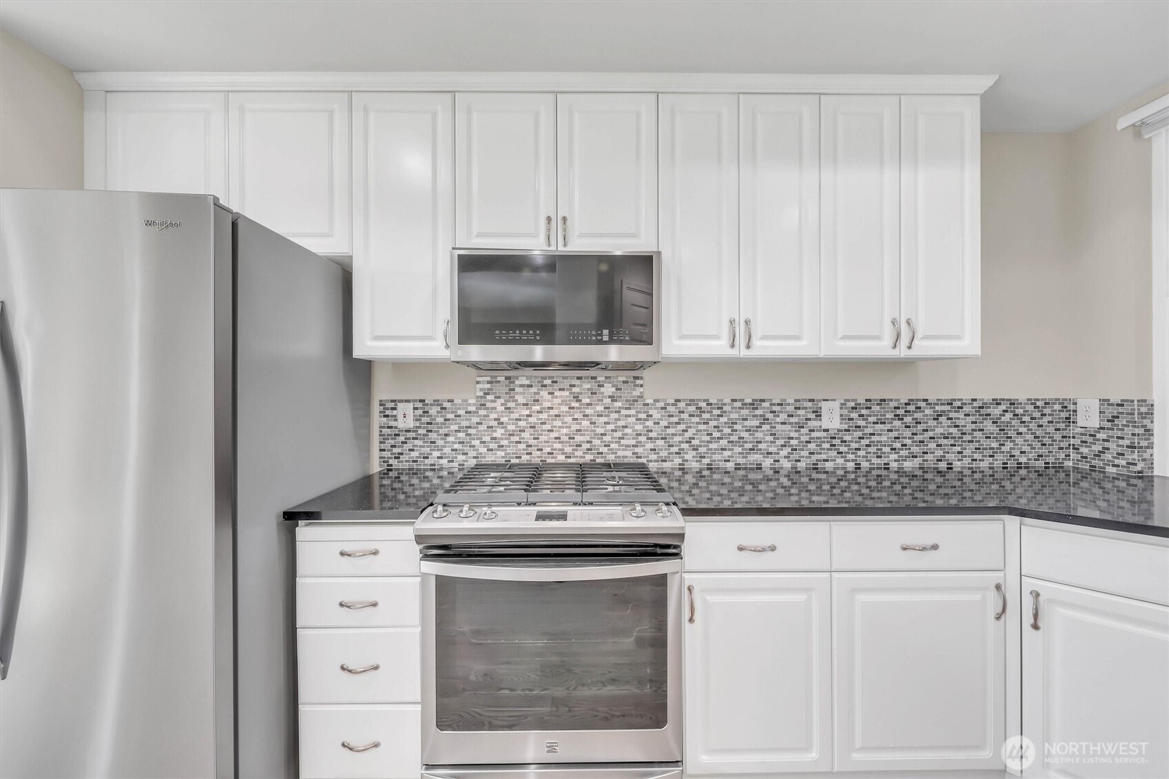 Lots of kitchen cabinets and counter space