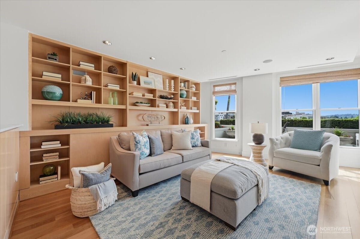 Family Room Features a Wall of Built-In Shelving