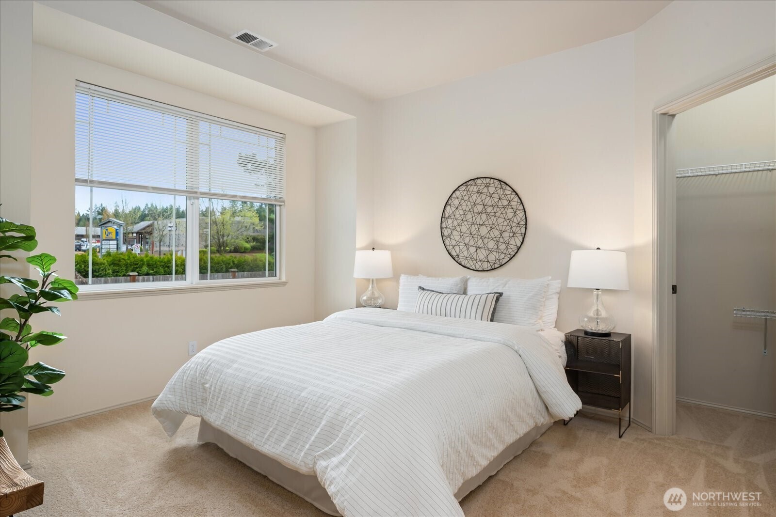 Guest Bedroom with a walk-in closet or use it as a home-office.