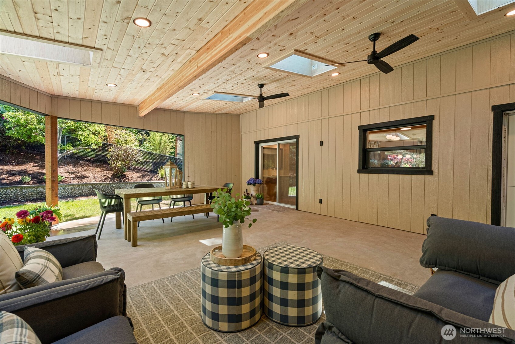 Off the kitchen you can access the 700 sqft, covered, outdoor patio.