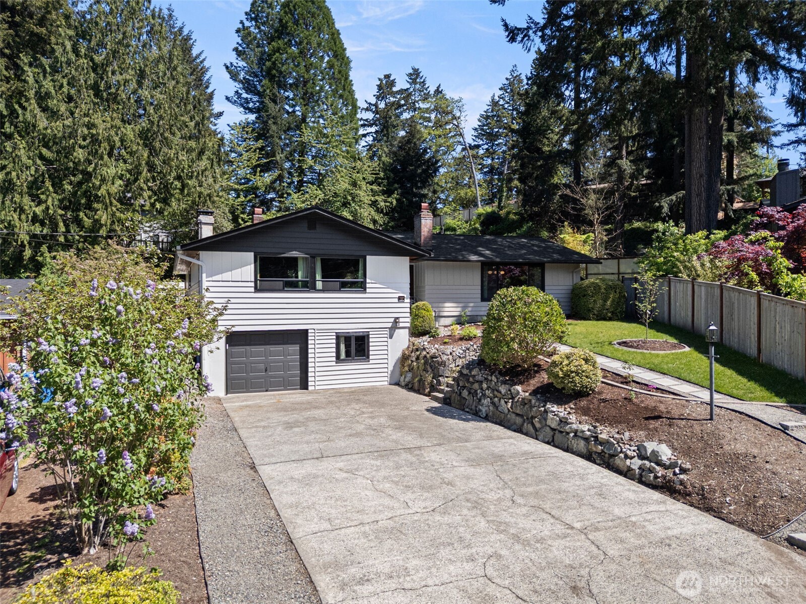 The garage has an additional room/flex space perfect for hobbies or additional storage.