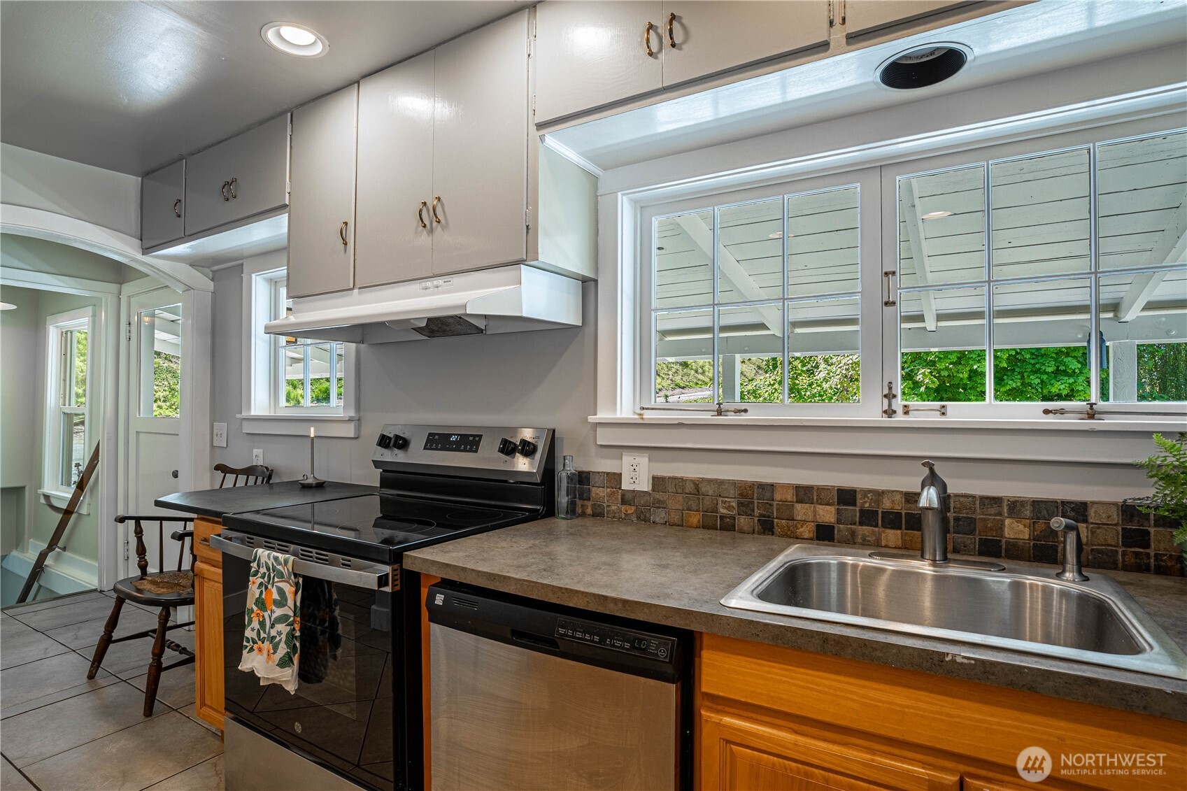 Kitchen features a Dutch Door to view deck