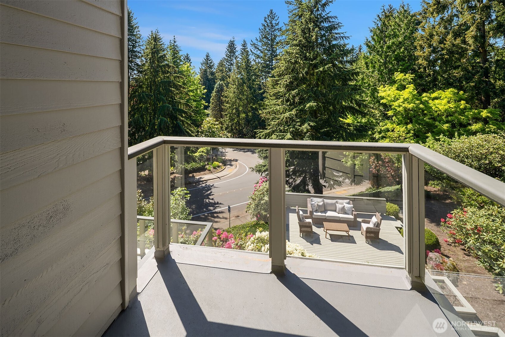 Private deck off primary bedroom with lovely garden view