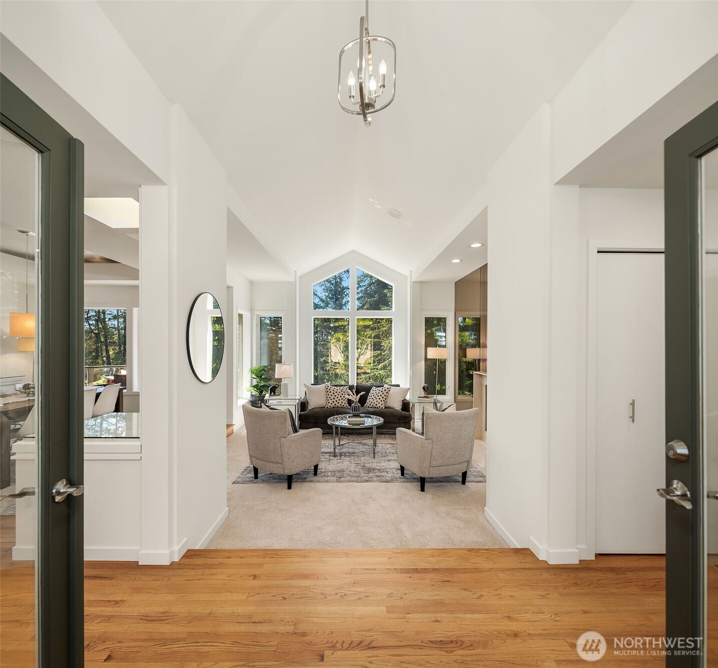 Welcoming entry opens to the great room with large picture windows