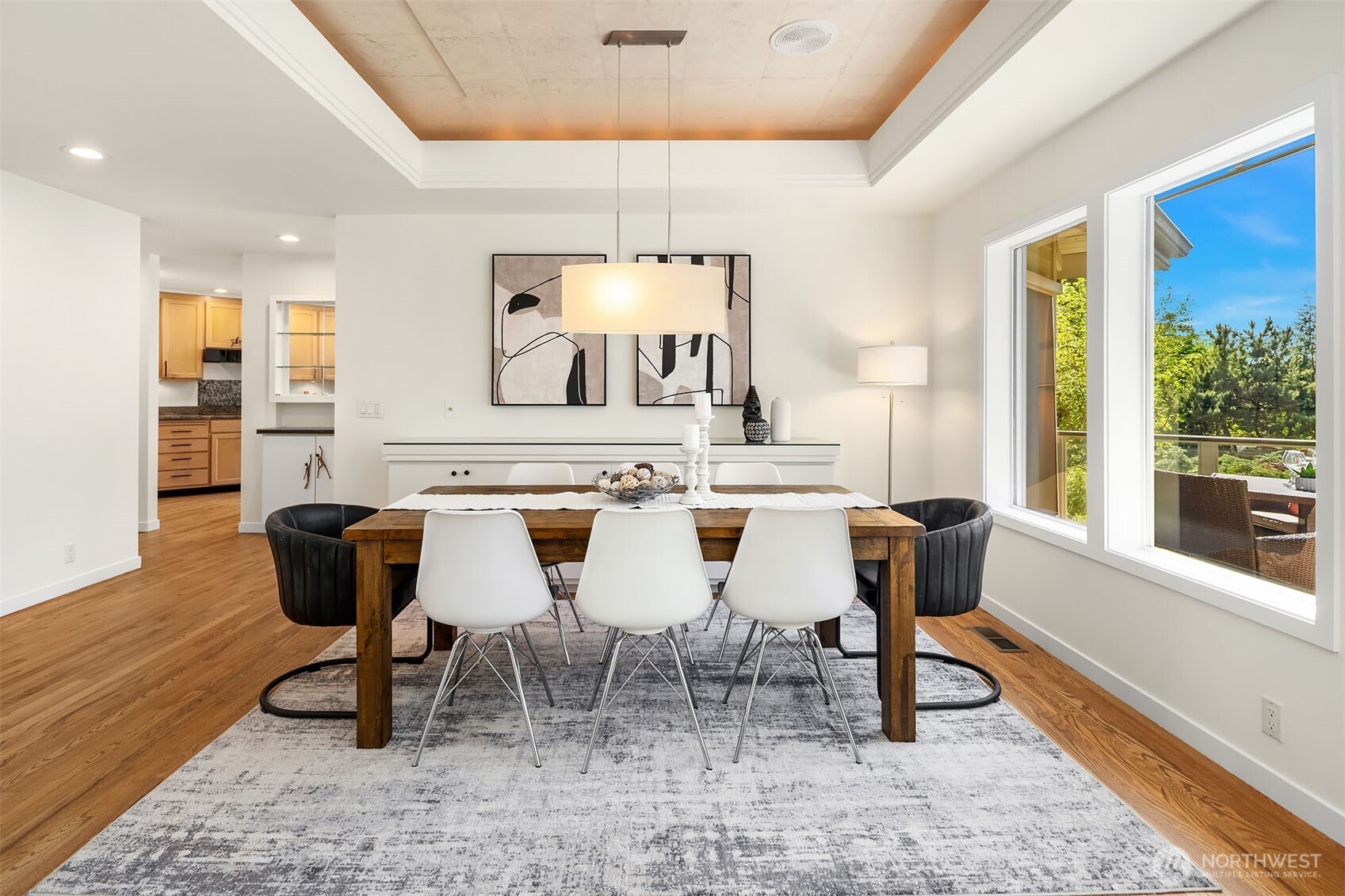 Spacious dining room offers large or intimate gatherings and opens to kitchen