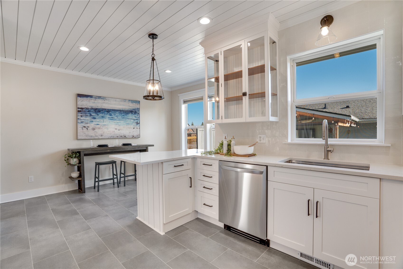 Kitchen to deck in three steps. The outdoor room is through that window.