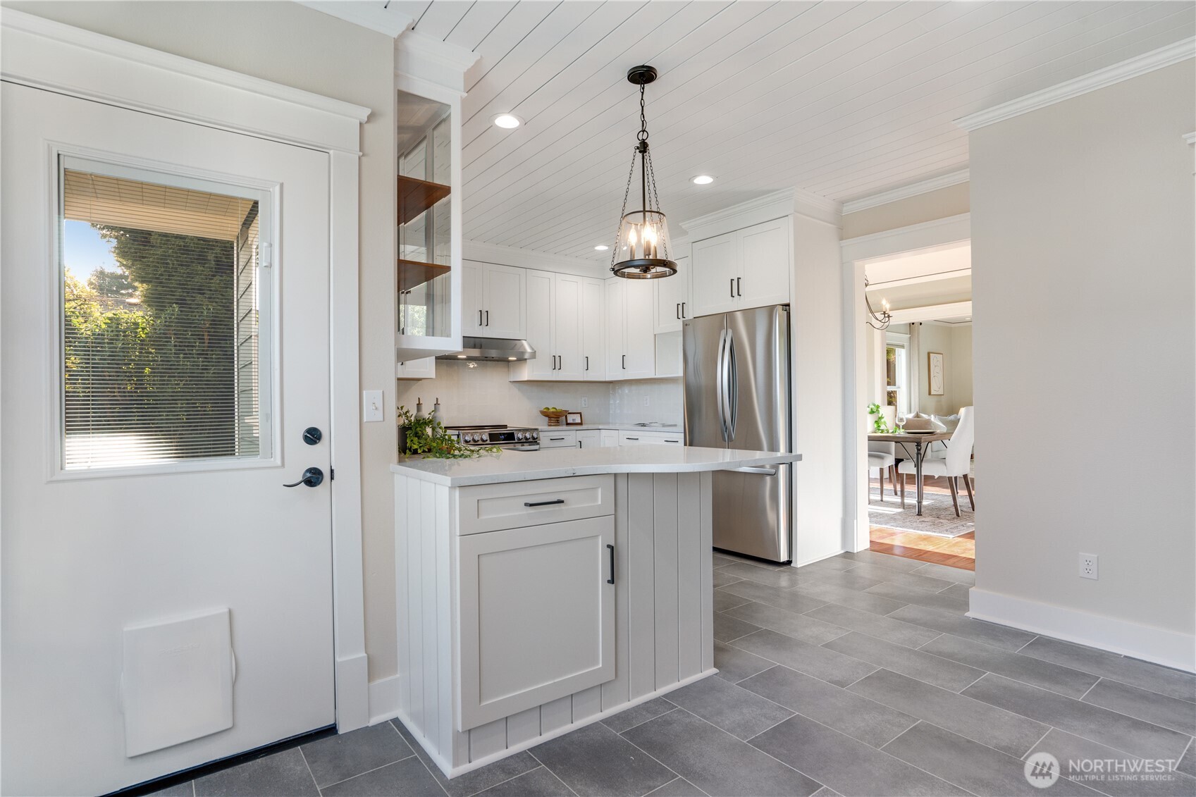 Back door. Kitchen. Dining room. The whole main floor flows like this.