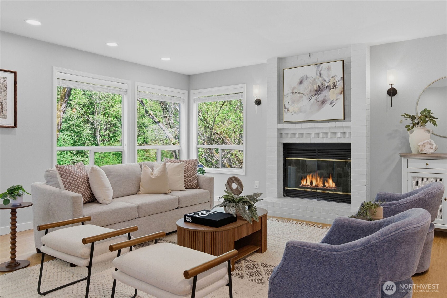 The entry foyer opens to bright living and dining rooms with vaulted ceilings and abundant natural light.