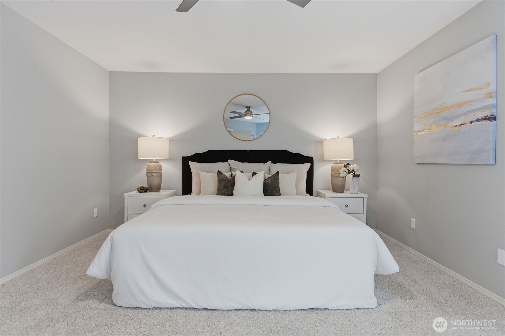 Primary suite with french doors fits kings bed.