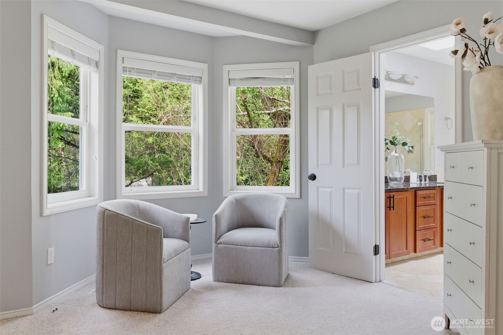 Primary suite overlooks beautiful retention pond.