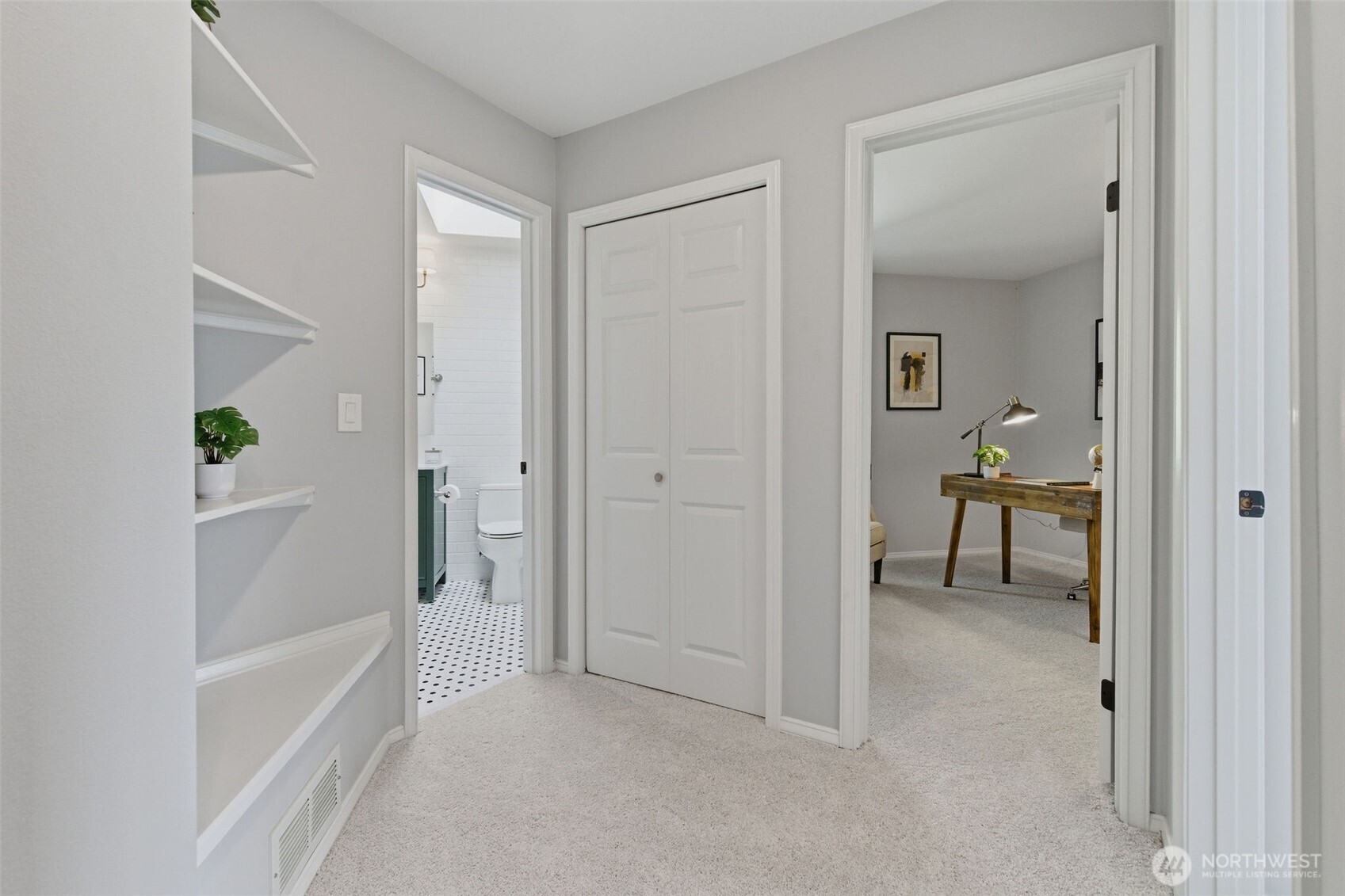 New carpets, remodeled hall bathroom and custom closets in every room make this home move-in ready.
