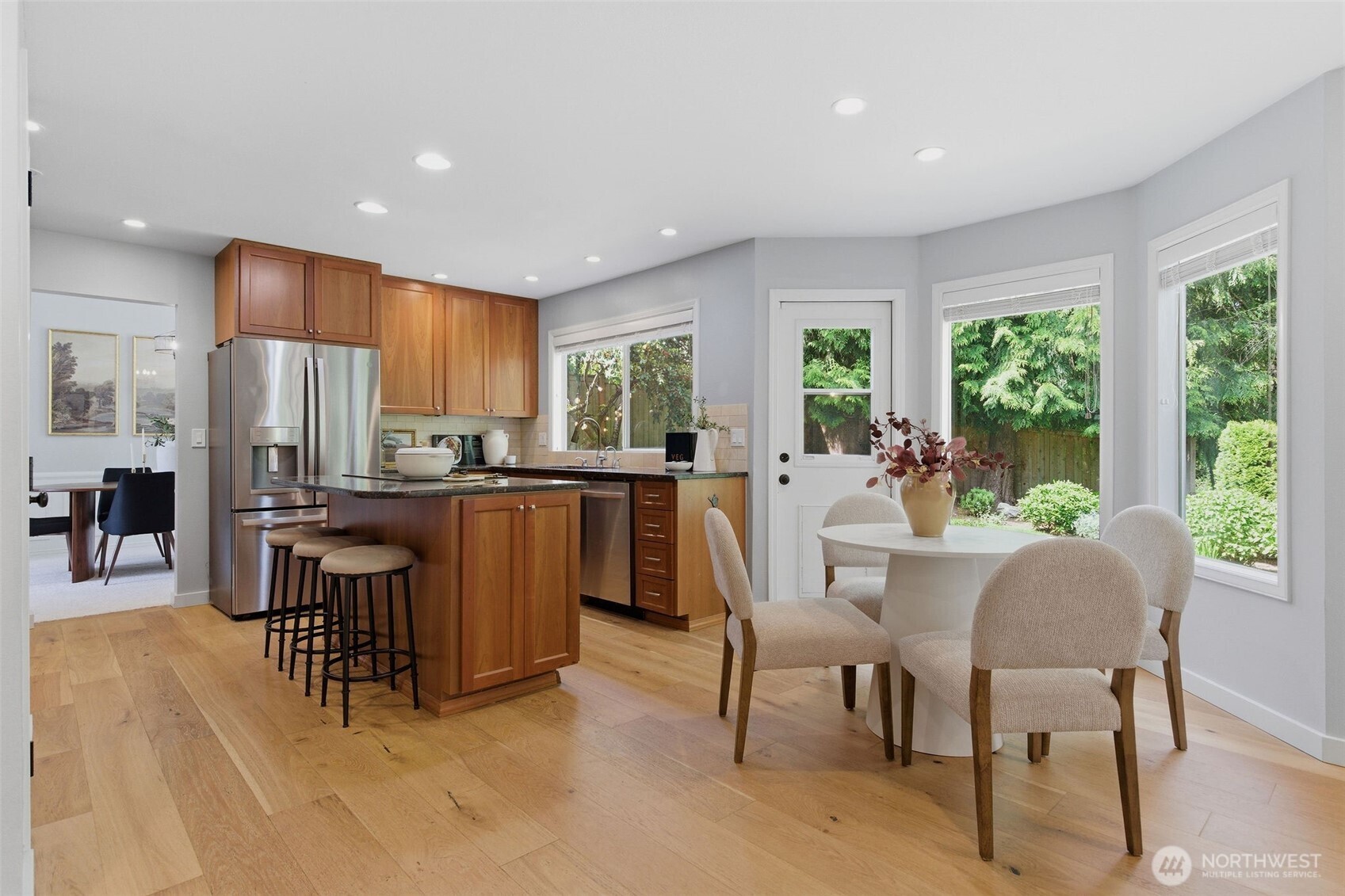 Main floor suite off the hallway is perfect for work from home or as guest room with den.