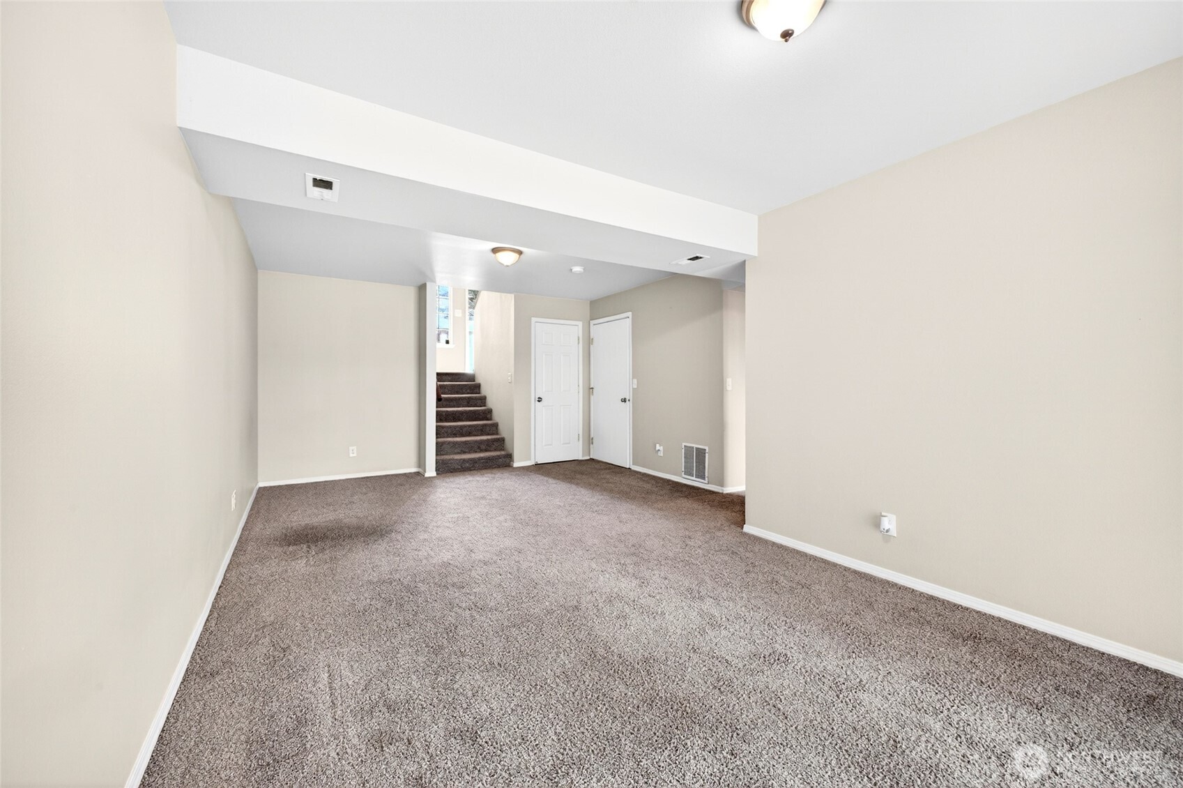 Second view of large lower level bonus room