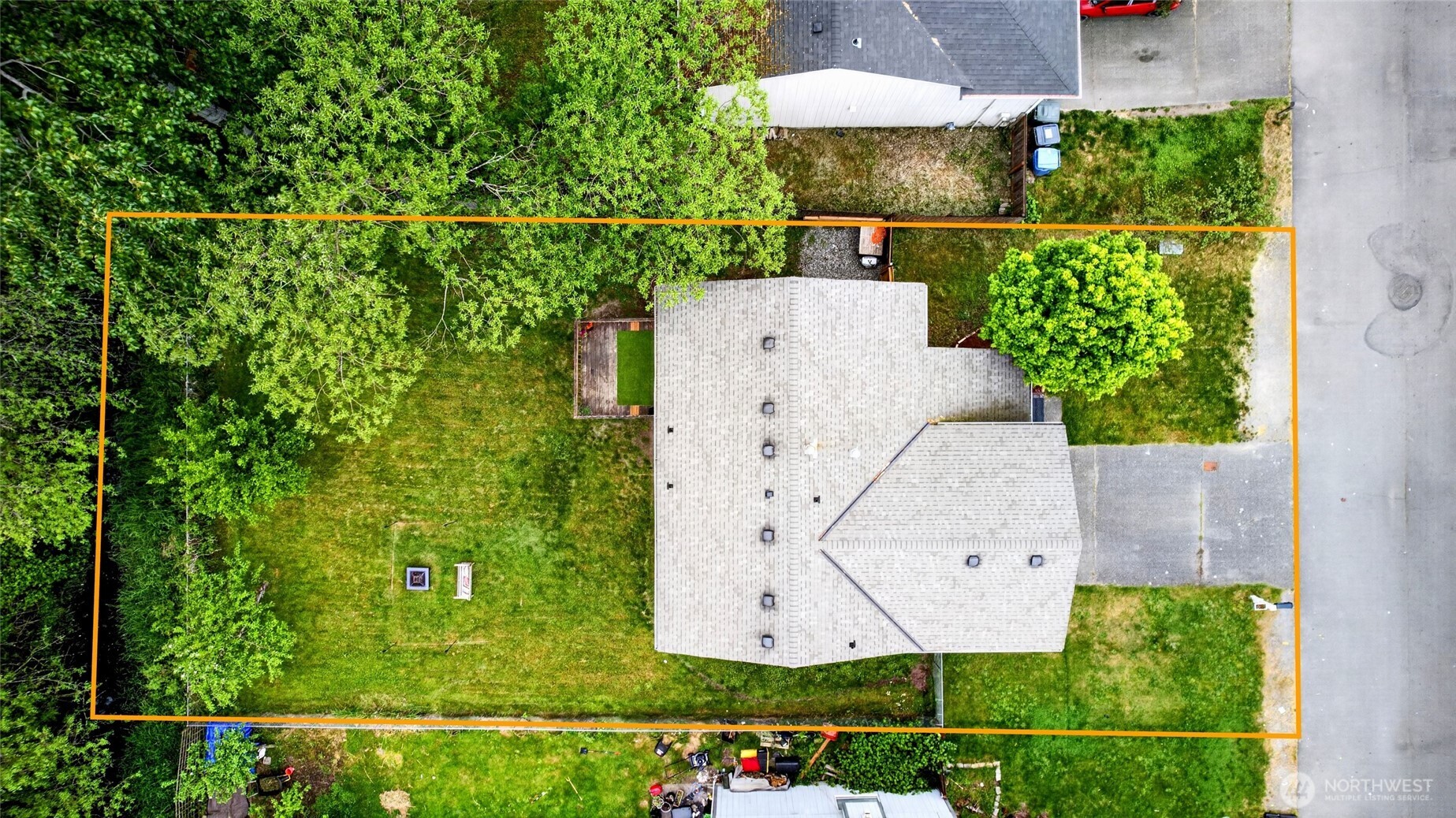 Aeiral view of this large home and lot with privacy in back yard and walking distance to elementary school playground