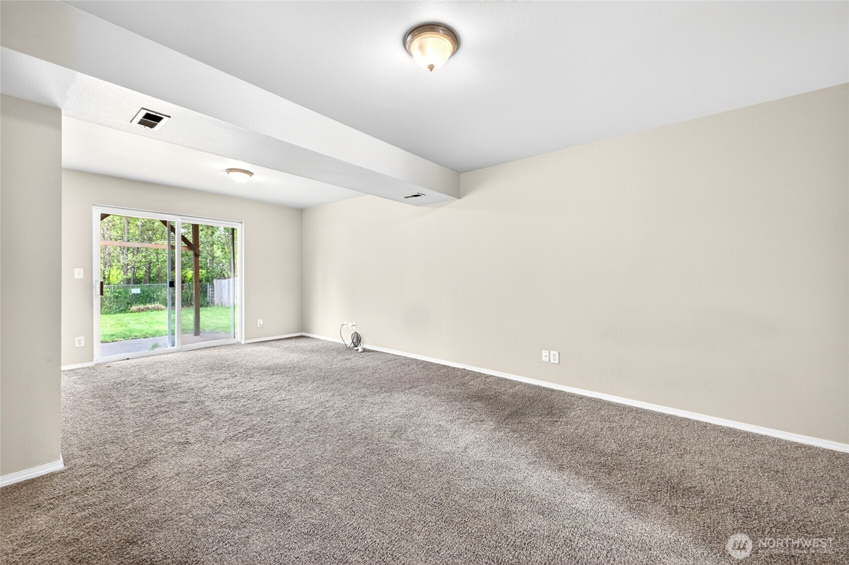 Lower level great room view outside to back yard and seperate access for rental or guest to rent out on vacation rentals