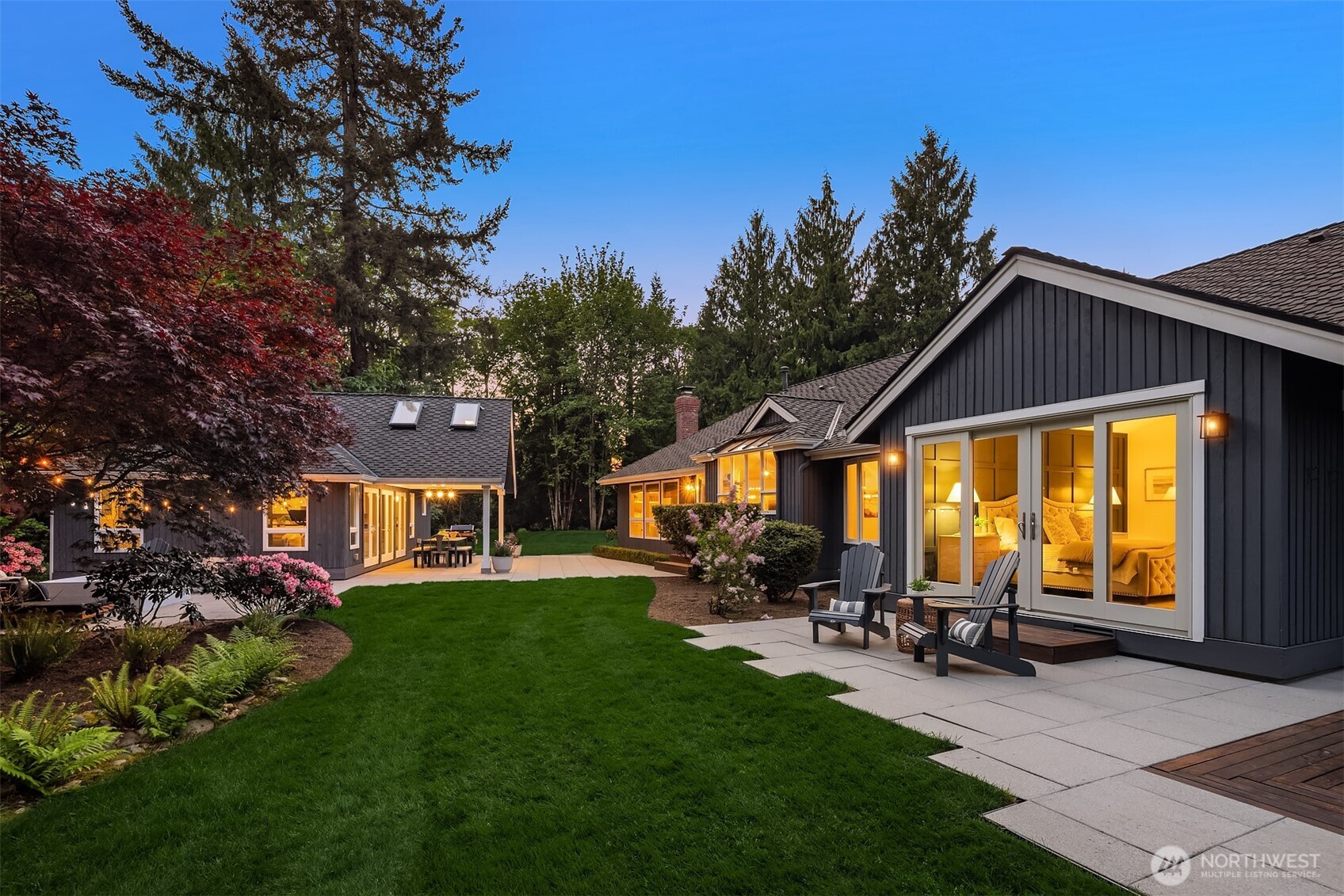 Expansive Backyard view of Main Home and Cottage