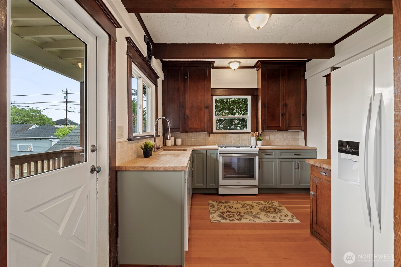Porch access for your morning coffee, right off the kitchen