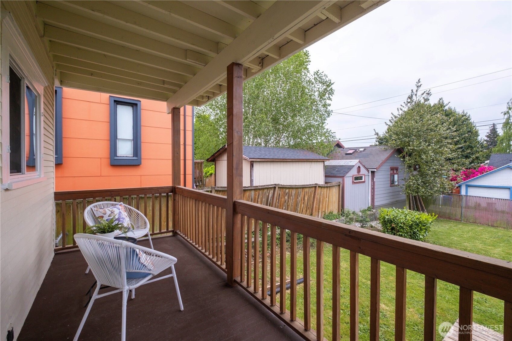 Enjoy the peaceful back yard from your kitchen porch