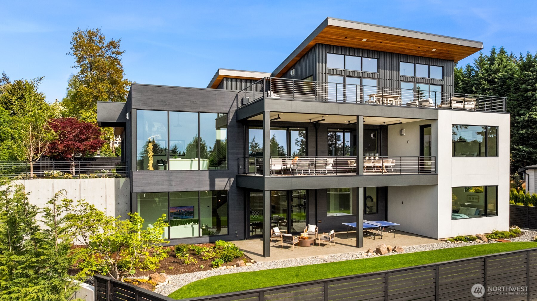 Generous outdoor spaces on every level with a secure private yard.