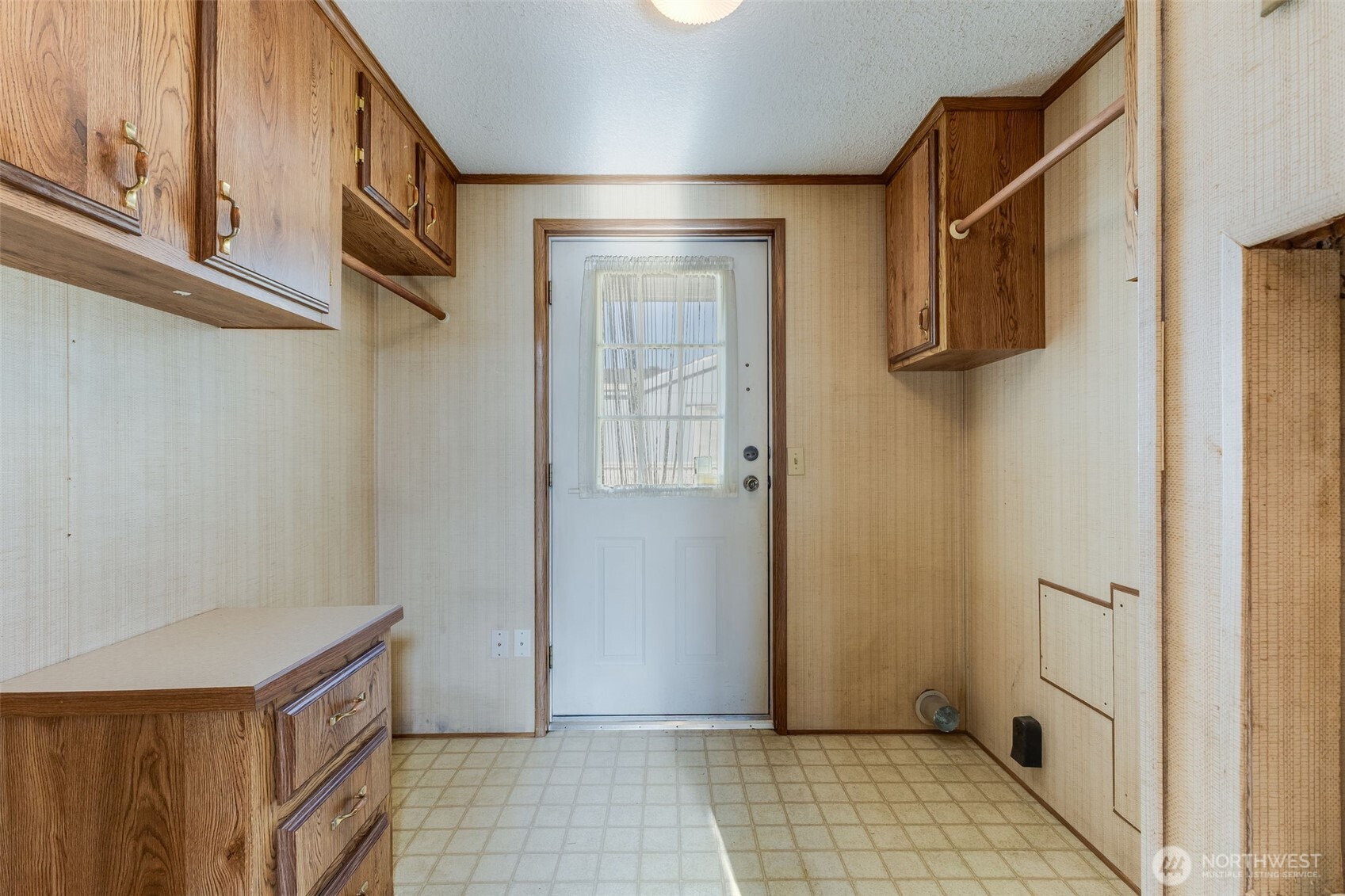 Laundry area is bright and big
