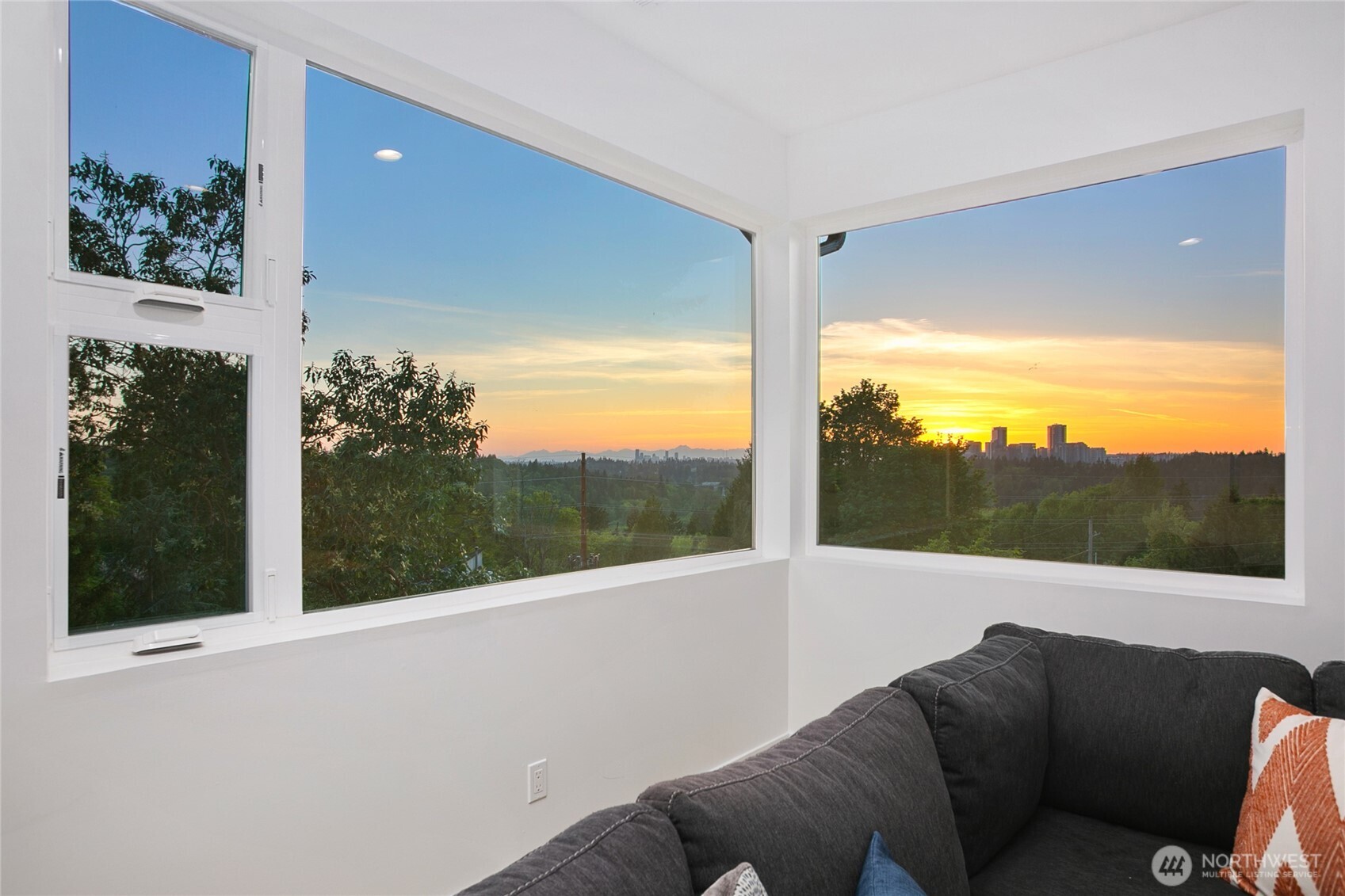 Wake up each morning to breathtaking city skyline views from the comfort of the luxurious primary suite