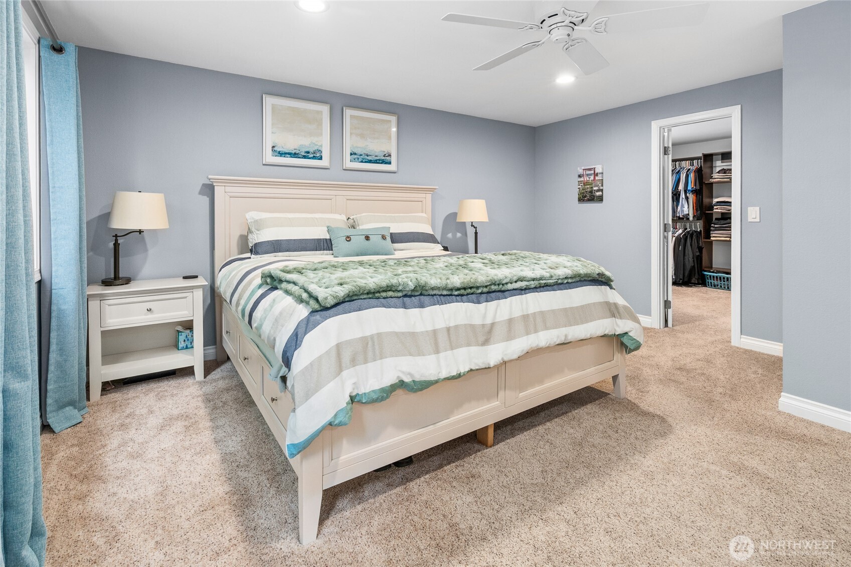 Owner Suite with huge walk-in closet, windows to backyard, en-suite bathroom with 2 sinks and large glass shower!