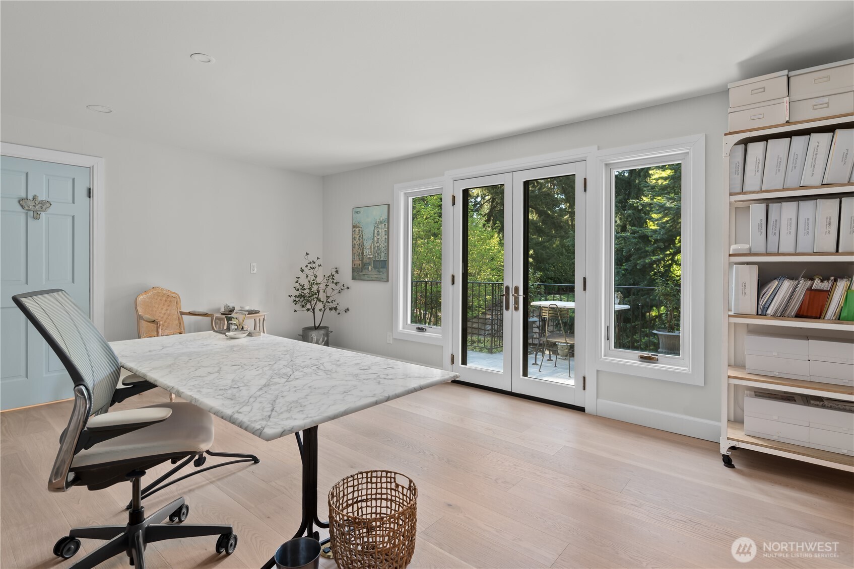 Primary suite with walk-in closet, full bathroom with dual vanities and heated floors, and entry into nursery.