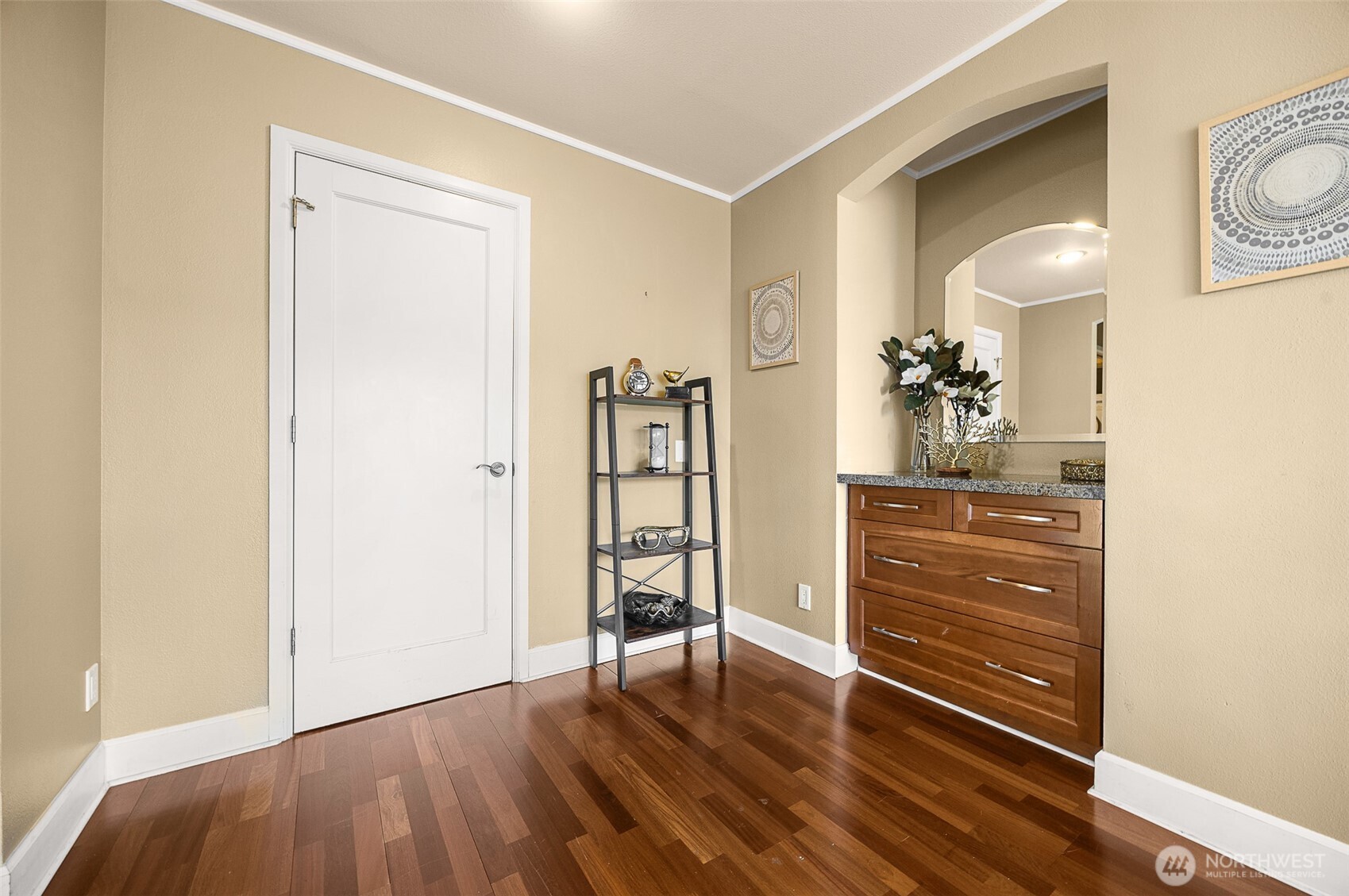 Primary bedroom walk-in closet door.