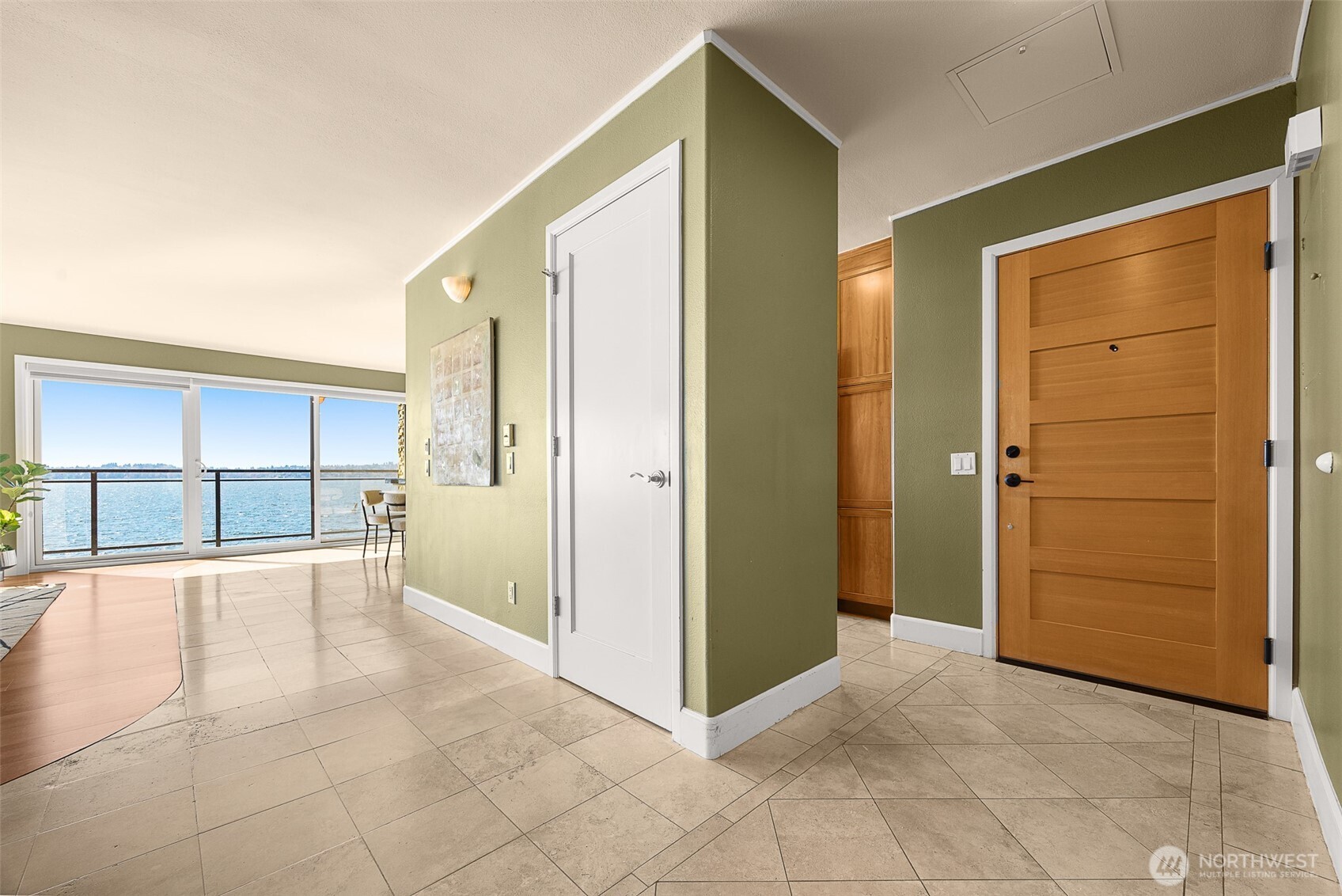 Entry area looking west. Outside deck and view.