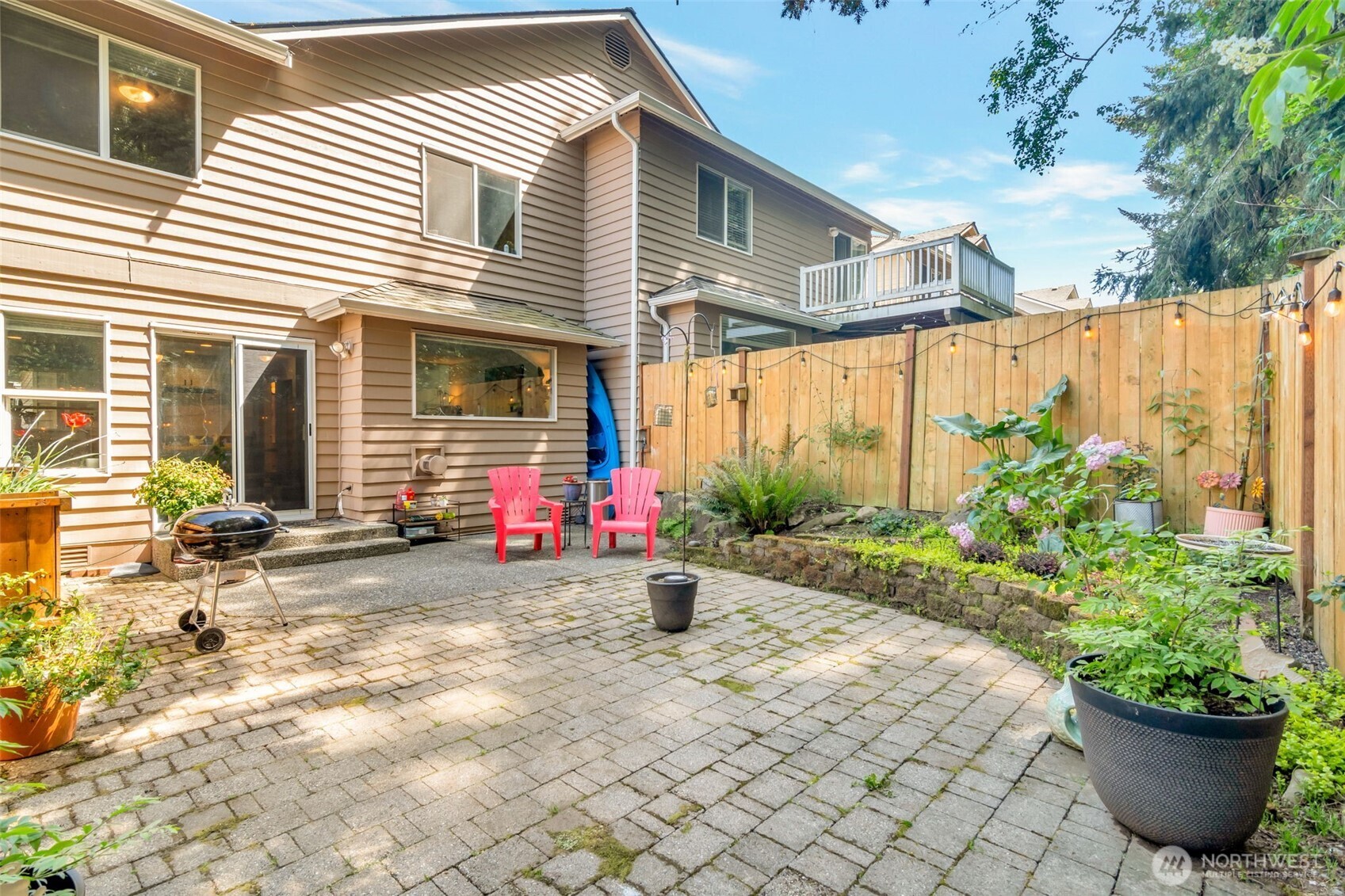 Your private backyard retreat is a haven of nature and serenity! Sit back and listen to the birds and you'll unwind while feeling miles away!
