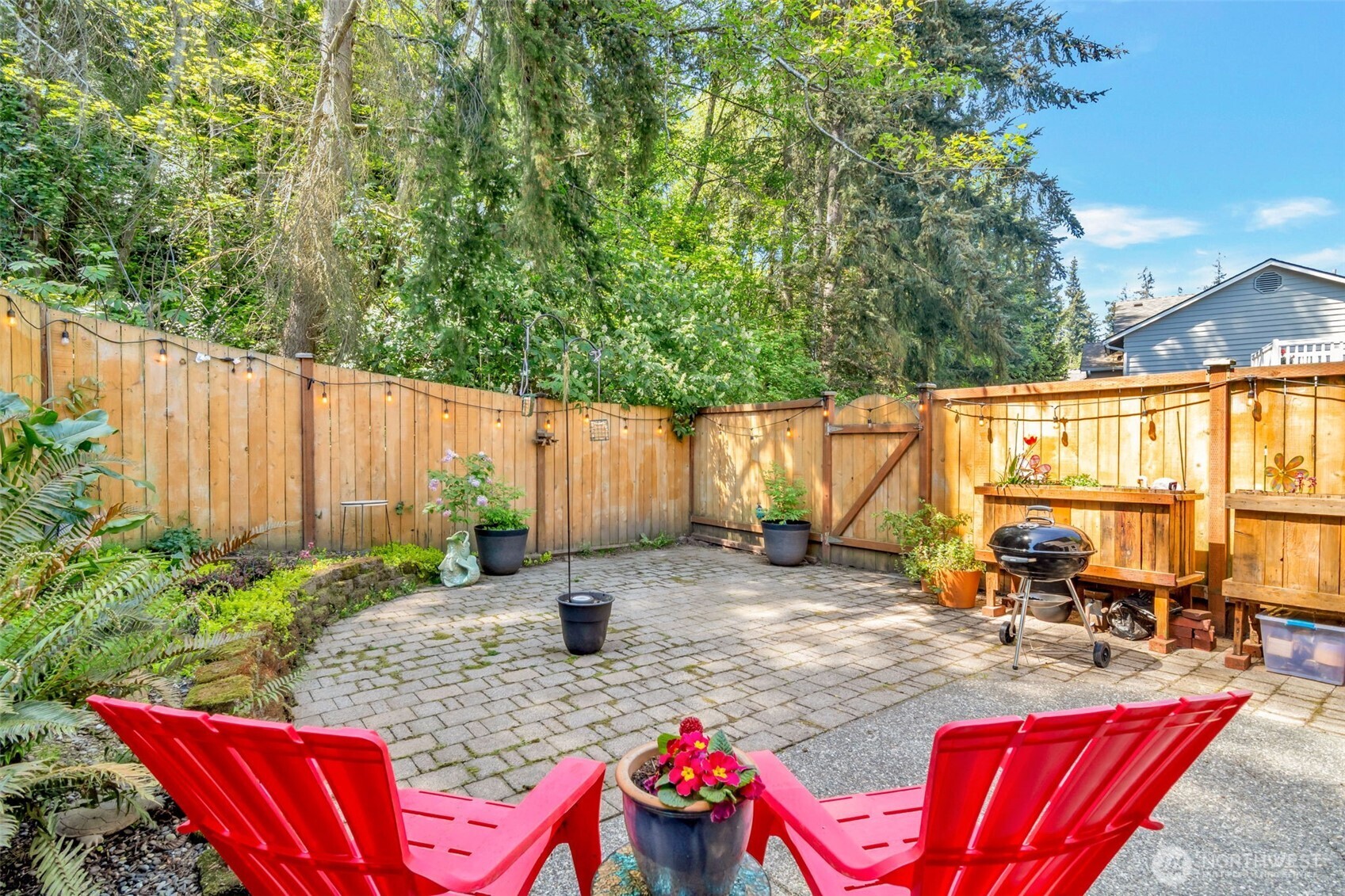 Full of mature landscaping and annual flowers, this working garden is a work of art!