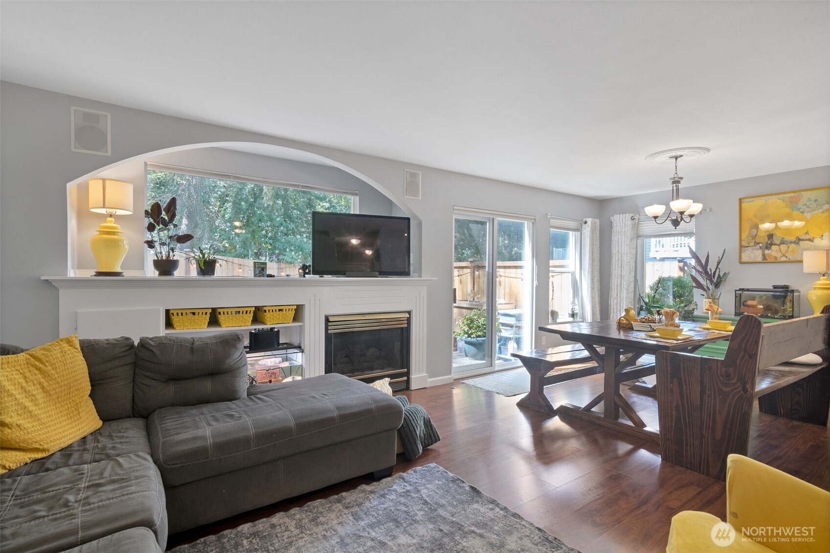 The open floor plan and large windows allow light to flood the home!