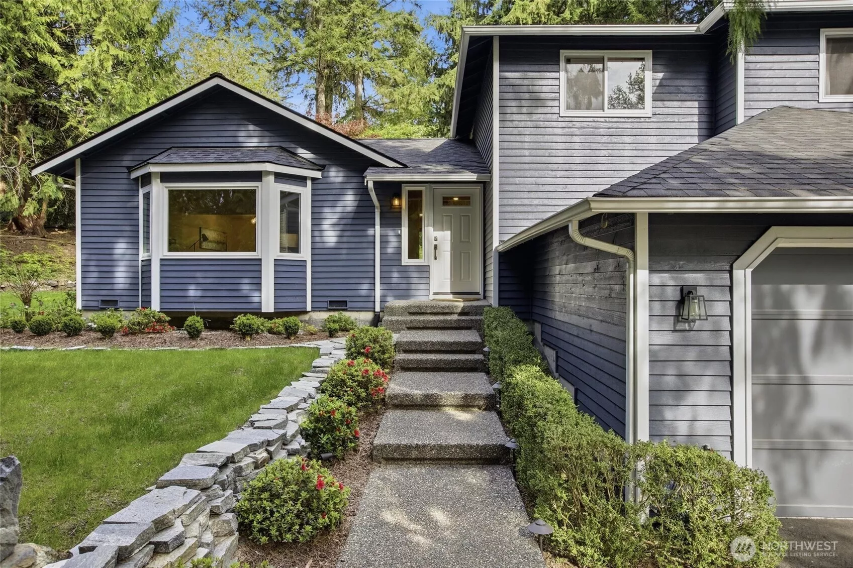 Private Woodinville retreat on a landscaped 0.71 acre lot in a quiet cul de sac just minutes from downtown Woodinville